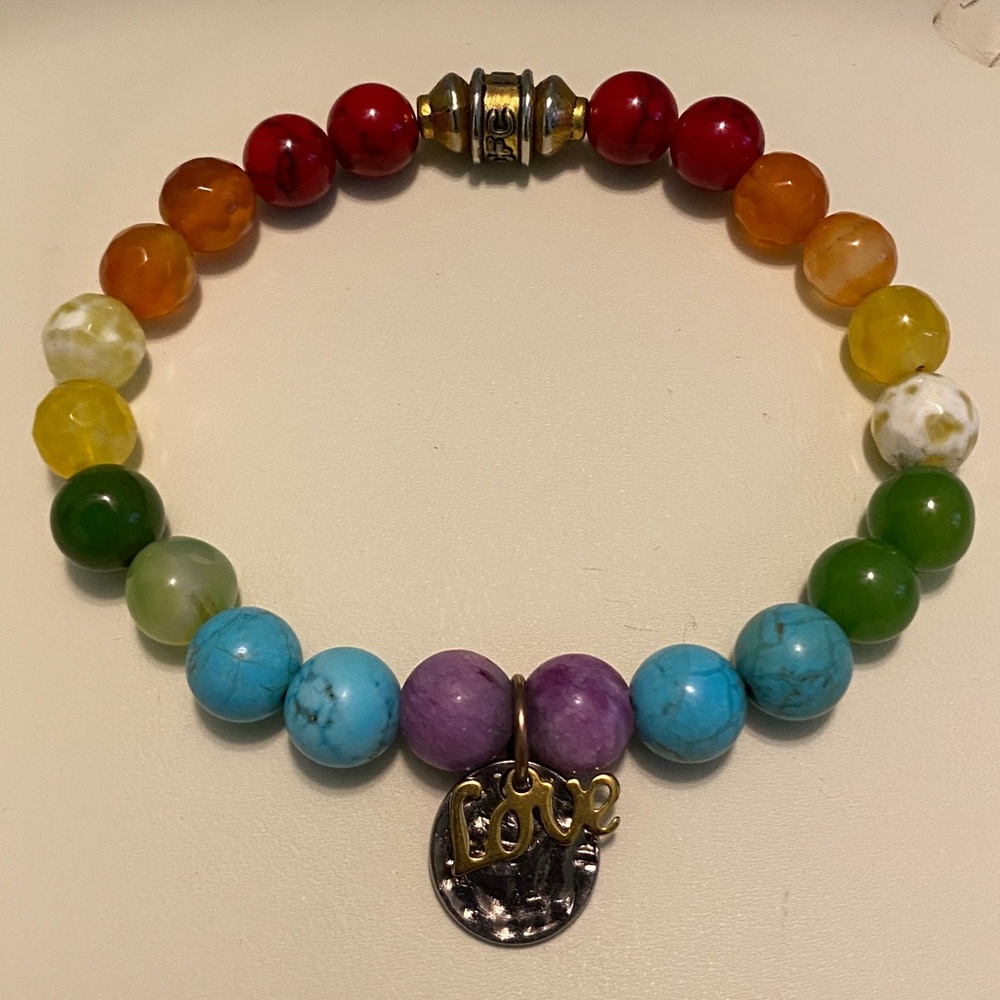 7-chakra beaded bracelet with a 'love' charm